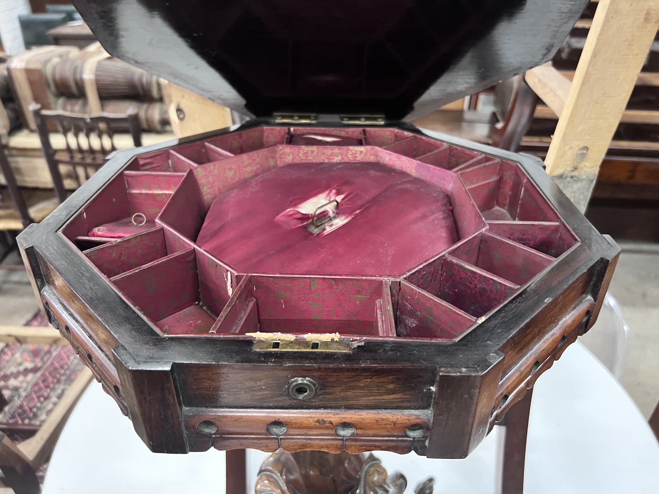 A Victorian octagonal rosewood trumpet work table, width 44cm, height 74cm